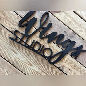 Wood sign WINGS STUDIO Black